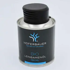 Leinsamenöl in schwarzer Blechdose