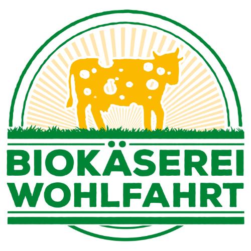 Logo Biokäserei mit Kuh im Hintergrund