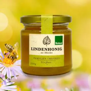 Glas Lindenhonig auf Blumen und freier Biene